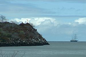 Three-masted ship around the corner at Baltra island in the Galapagos.